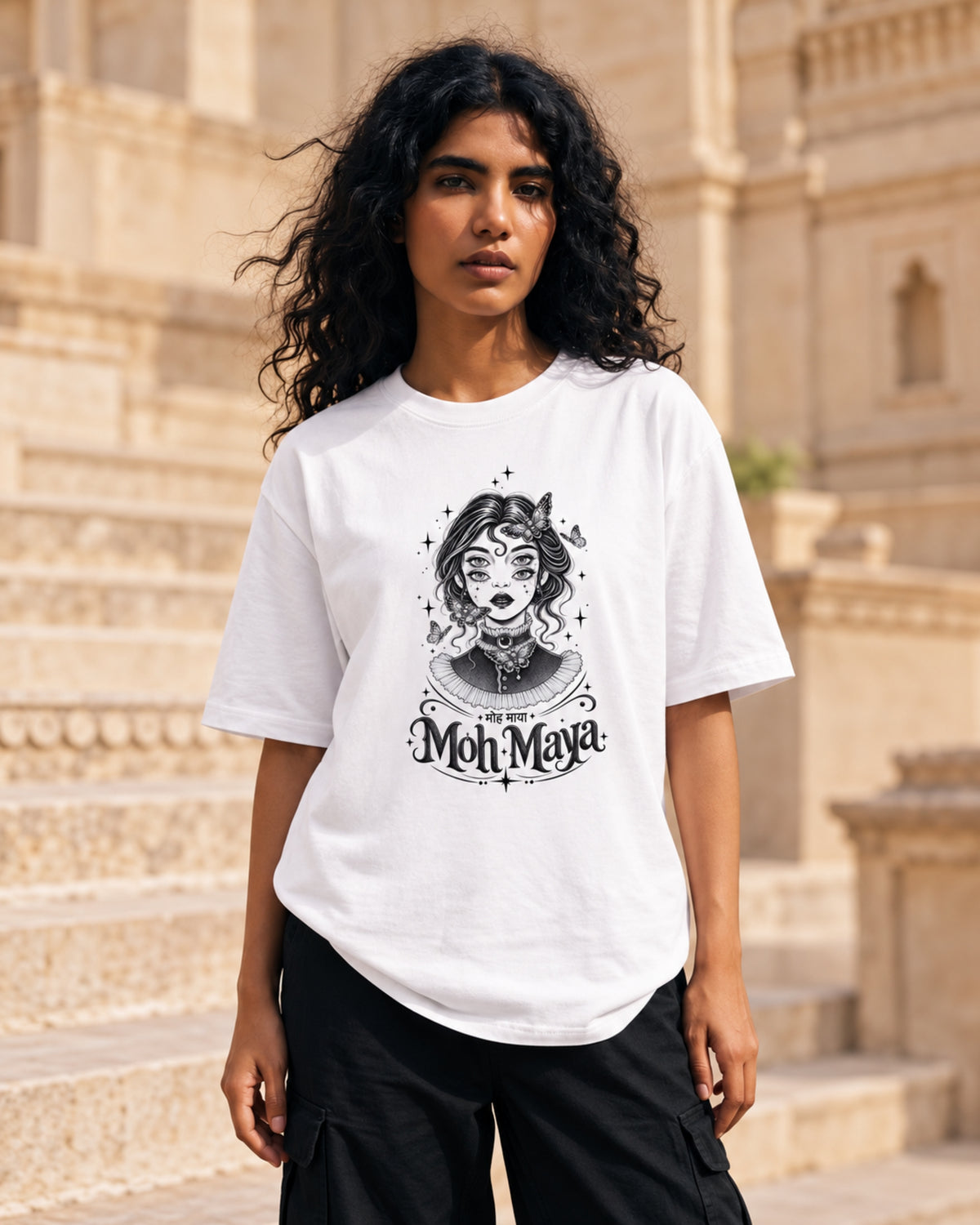 Moh Maya white oversized tee worn by a model