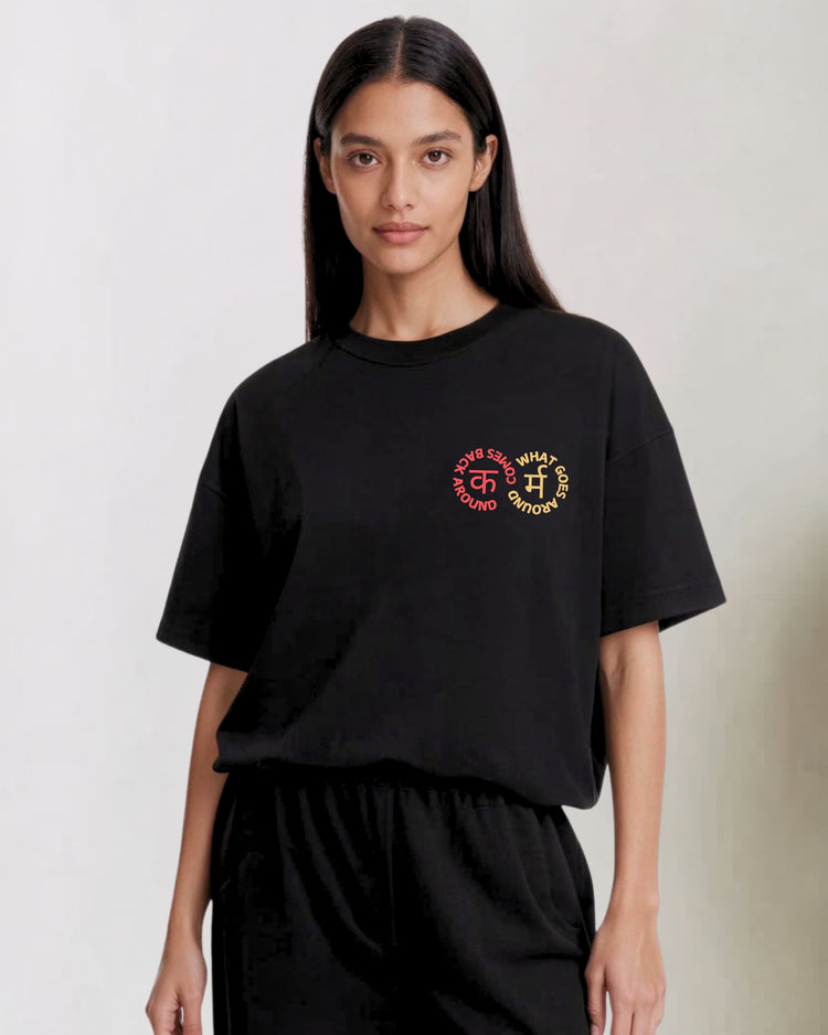Model wearing the Karma black oversized tee
