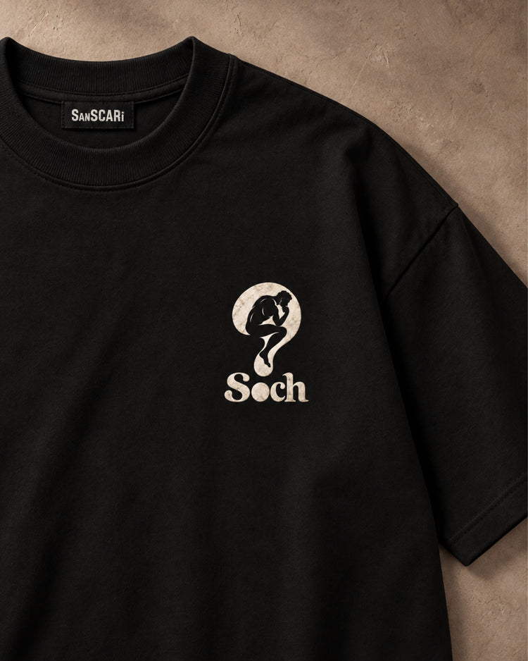 Soch black oversized tee laid flat, close-up of the thinker print