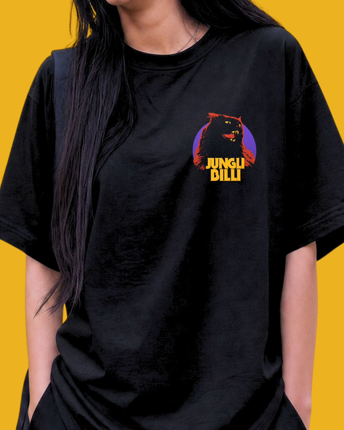 Jungli Billi black oversized tee with a purple and yellow cat chest print