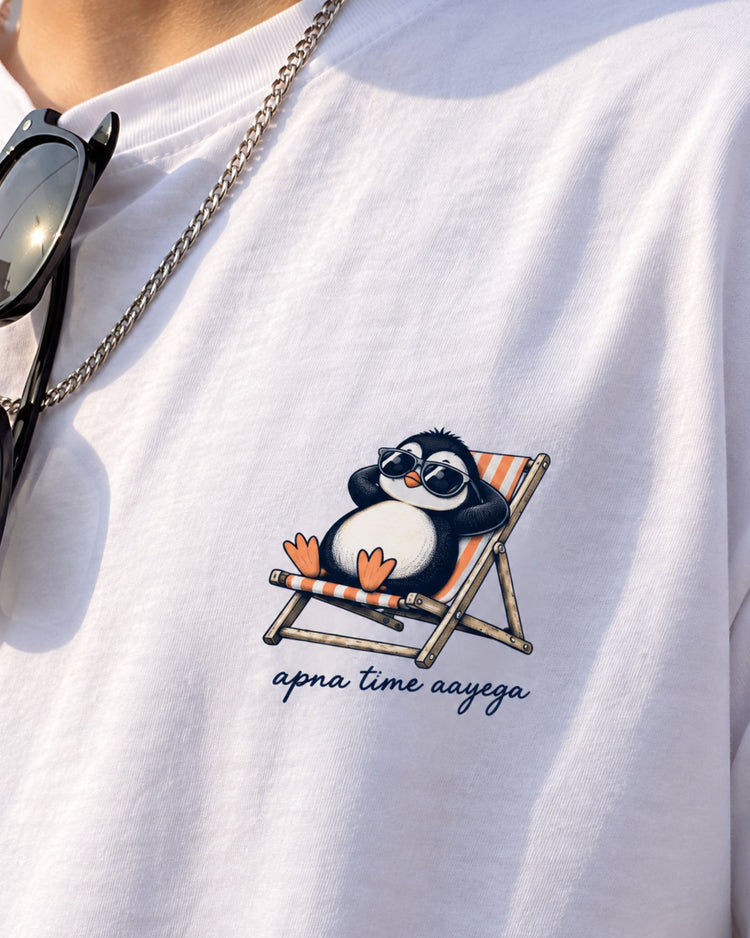 Close-up of the Apna Time Aayega penguin on a deck chair print