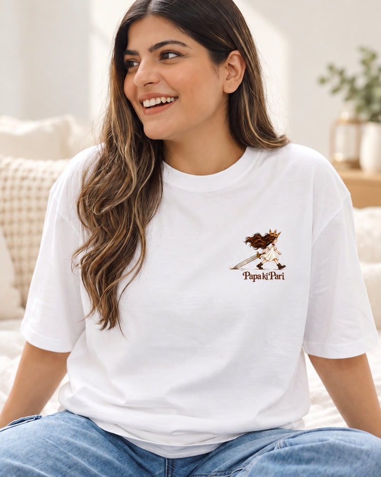 Model smiling in the Papa ki Pari white oversized tee