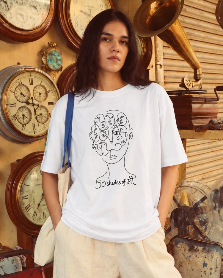 50 Shades of मी white tee styled with light trousers, full length