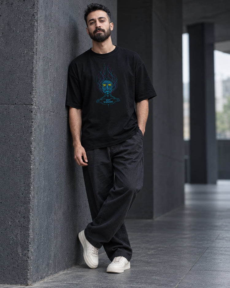 Aham Brahmasmi black tee styled with black trousers, full length